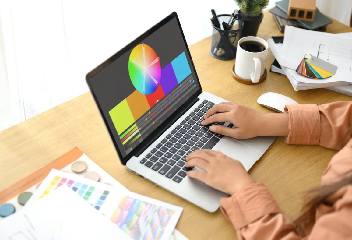 graphic designer desk laptop